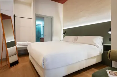 Cama o camas de una habitación en Acueducto Suites Apartments I