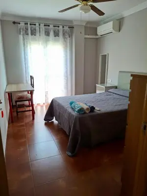 Cama o camas de una habitación en Luminoso antequera