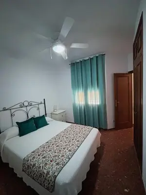 Cama o camas de una habitación en Alojamiento rural El Membrillo