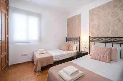Cama o camas de una habitación en Las Setas en el corazón de Sevilla