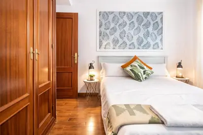 Cama o camas de una habitación en Las Setas en el corazón de Sevilla