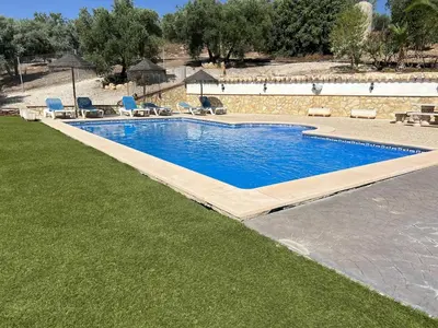 Piscina en o cerca de Cortijo rural la loma de los bandoleros