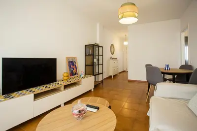 Una televisión o centro de entretenimiento en Wish Suite Bulería Sevilla