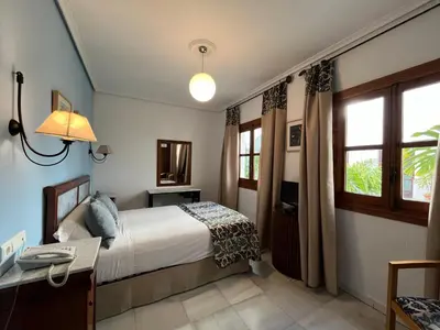 Cama o camas de una habitación en Hotel Maestre