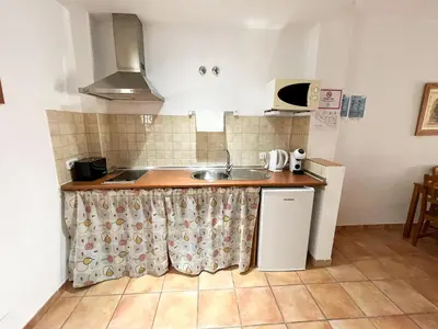 Una cocina o zona de cocina en Apartamentos Villa Torcal