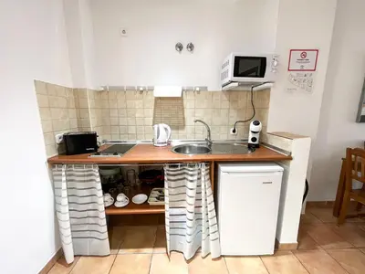 Una cocina o zona de cocina en Apartamentos Villa Torcal