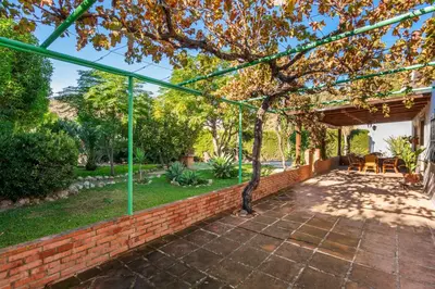 Jardín al aire libre en Casa La Encina