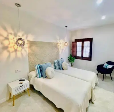 Cama o camas de una habitación en Hotel Rural Sisapo