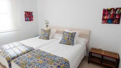 Cama o camas de una habitación en Amparo Cinco