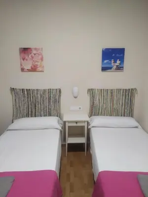 Cama o camas de una habitación en Pension Azahar