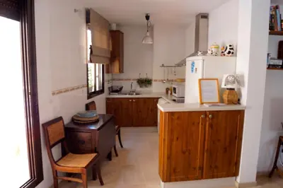 Una cocina o zona de cocina en Penthouse Puerta de la Judería