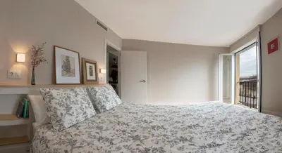 Cama o camas de una habitación en Tu Casa En El Rio