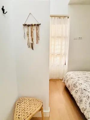 Cama o camas de una habitación en La buhardilla