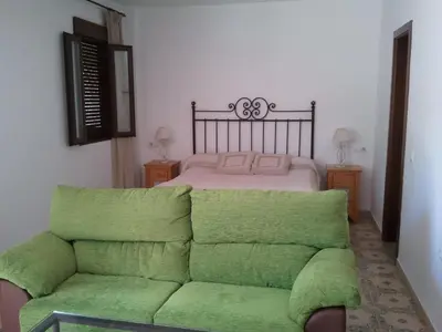 Zona de estar de Apartamentos La Venta del Charco