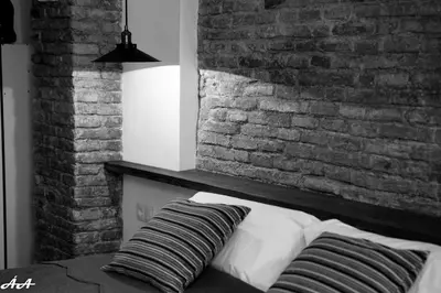 Cama o camas de una habitación en Fuentepiedra Casa Rural Categoría Superior