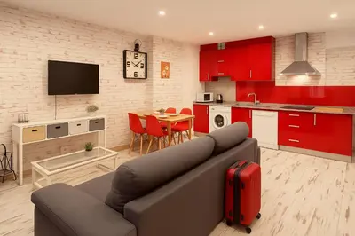 Una cocina o zona de cocina en Apartamentos Sevilla Palace