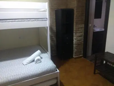 Cama o camas de una habitación en Casa Sevilla Nervión-Centro