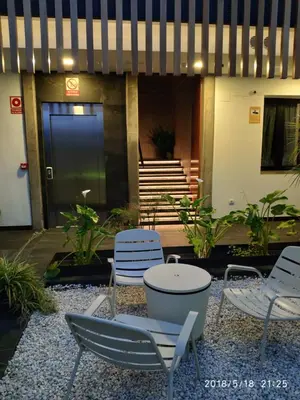 Jardín al aire libre en Apartamentos Córdoba Atrium