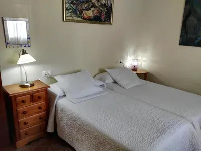 Cama o camas de una habitación en Casa Rural Orégano