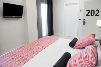 Cama o camas de una habitación en Itaca Artemisa by Soho Boutique