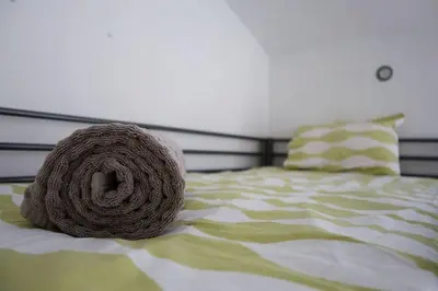 Cama o camas de una habitación en Olive Branch El Chorro