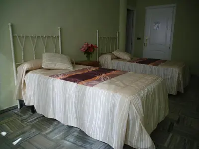 Cama o camas de una habitación en Escudo de Granada