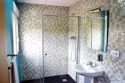 Un baño de Hostal Restaurante Los Mellizos