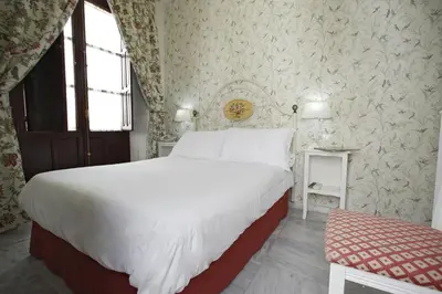 Cama o camas de una habitación en Basic Hotel Puerta de Sevilla