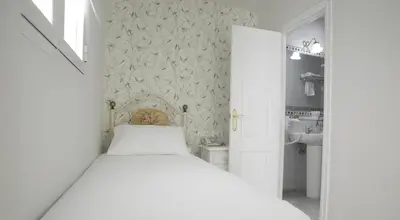 Cama o camas de una habitación en Basic Hotel Puerta de Sevilla
