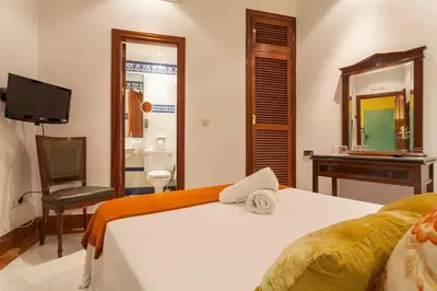 Cama o camas de una habitación en Hotel Baco
