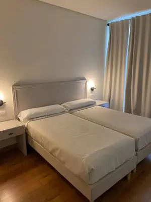 Cama o camas de una habitación en Hotel Santa Ana