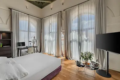 Cama o camas de una habitación en CoolRooms Palacio Villapanés 5 GL