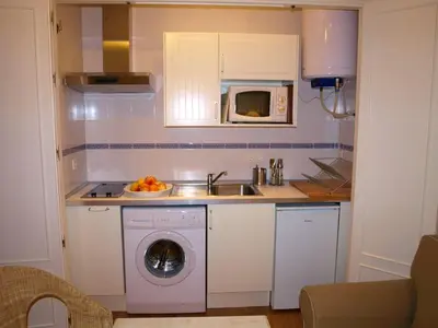 Una cocina o zona de cocina en Apartamento Centro Judería