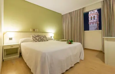 Cama o camas de una habitación en Hotel Platería