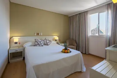 Cama o camas de una habitación en Hotel Platería