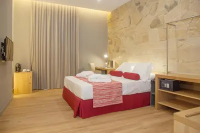 Cama o camas de una habitación en Soho Boutique Capuchinos & Spa