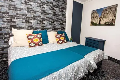 Cama o camas de una habitación en Hostal Caminito del Rey