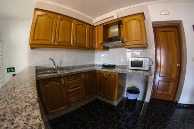 Una cocina o zona de cocina en Hostal Caminito del Rey
