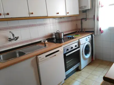 Una cocina o zona de cocina en Céntrico Donkey Parking