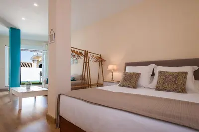 Cama o camas de una habitación en Hommyhome Pozo Santo Penthouse