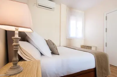 Cama o camas de una habitación en Hommyhome Pozo Santo Penthouse