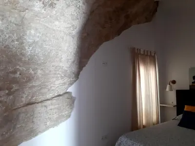 Cama o camas de una habitación en Casa Bajo la Roca