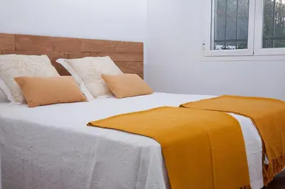 Cama o camas de una habitación en El Jardín de Wallada