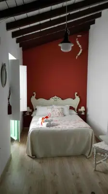 Cama o camas de una habitación en La Casa de la Costurera