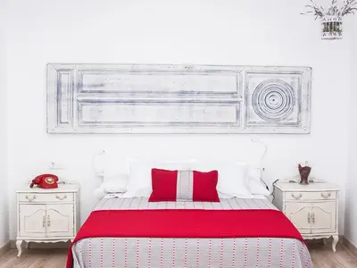 Cama o camas de una habitación en La Casa de la Costurera