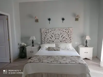 Cama o camas de una habitación en Finca La Favorita- Suites