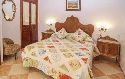 Cama o camas de una habitación en Four-Bedroom Holiday Home In Villaviciosa De Cordob