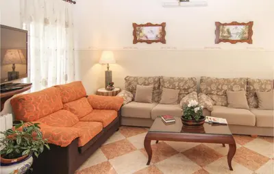 Zona de estar de Four-Bedroom Holiday Home In Villaviciosa De Cordob