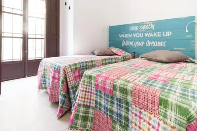 Cama o camas de una habitación en CN PARKING INCLUIDO Apartamento 2D en zona monumental