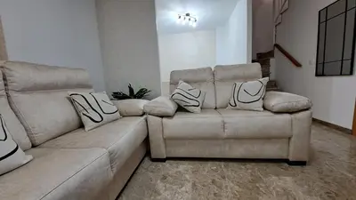 Zona de estar de Apartamentos Maria Cristina con parking privado gratis